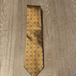 Gold and blue tie by Jos A Bank